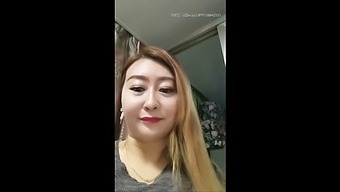Asian Mature Lady Indulges In Self-Pleasure