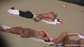 Amateur Lovers Bare It All At A Naturist Shoreline In A Covertly Recorded Video Of Voyeuristic Delight.